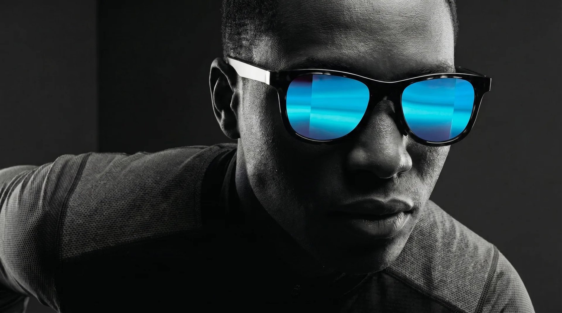 A runner mid-stride wearing HINDSIGHT rear-view mirror sunglasses — athletic portrait, the rear-view built into the lens.